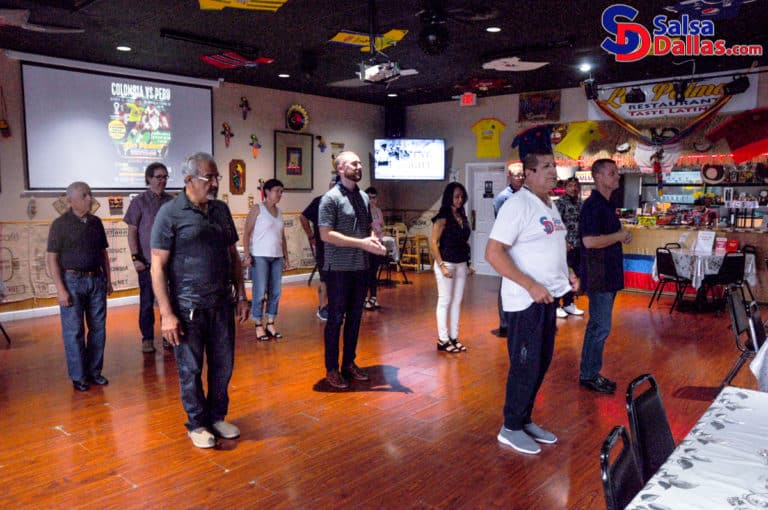 People participating in salsa dance lessons at Salsa Dallas entertainment venue in Dallas, Texas.