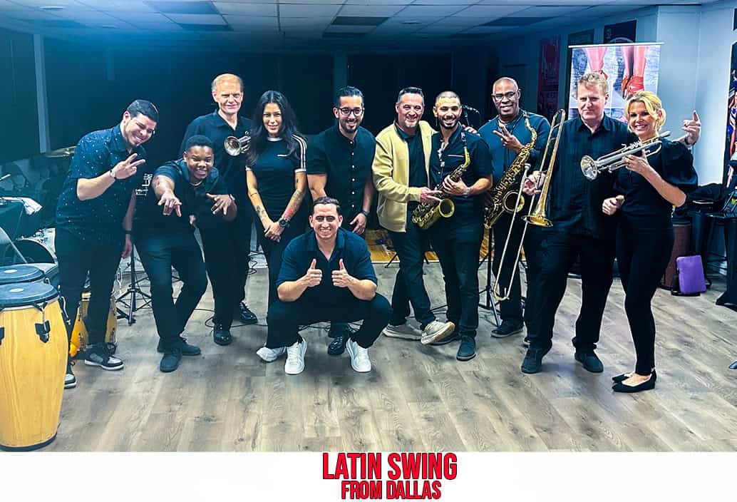 Salsa Dallas Latin dance instructors and musicians posing with instruments during salsa lessons at Salsa Dallas studio. Call or text 214-923-9404 for salsa classes and dance lessons in Dallas.